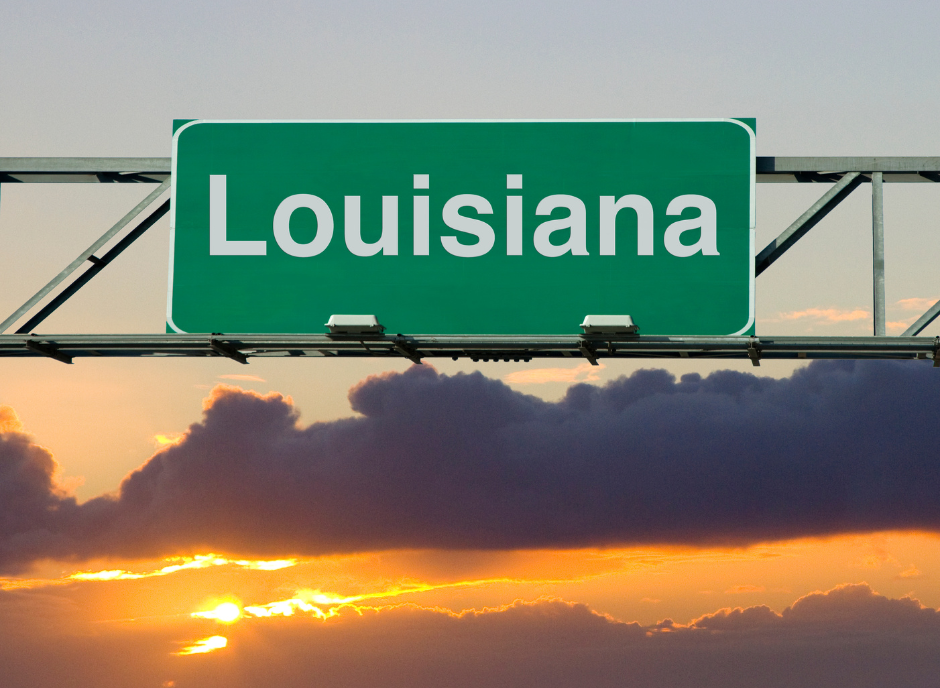 A picture of a street sign saying Louisiana.